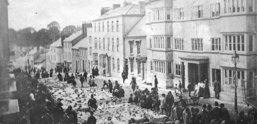 Honiton Market on the High Street circa 1908 by old Post Office (now the Manor House)