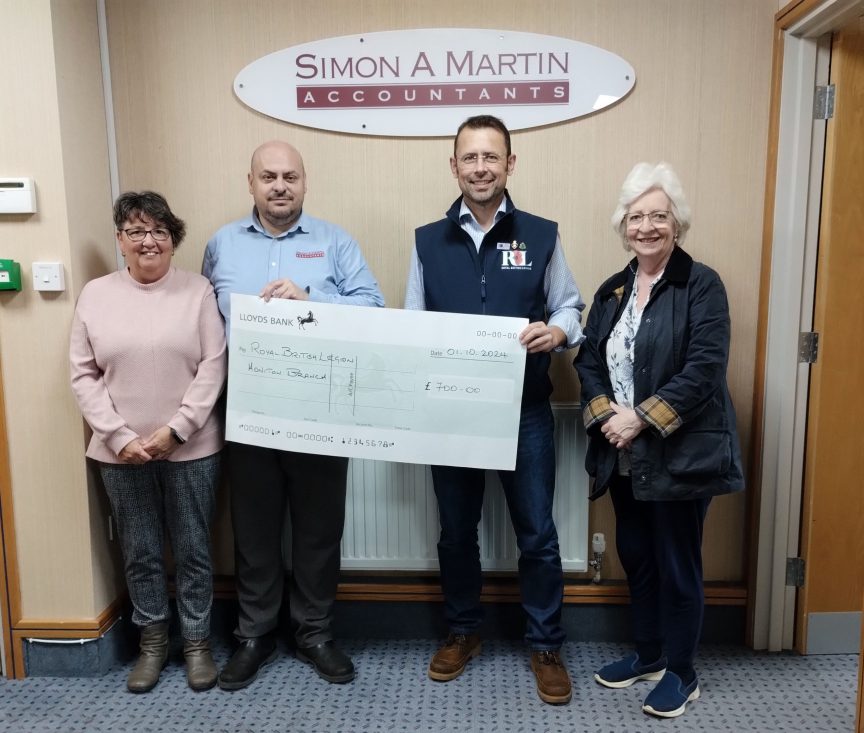 Representatives of Honiton Market Charter Day presenting a cheque to Nick Wadey, Chairman of the Royal British Legion Honiton Branch