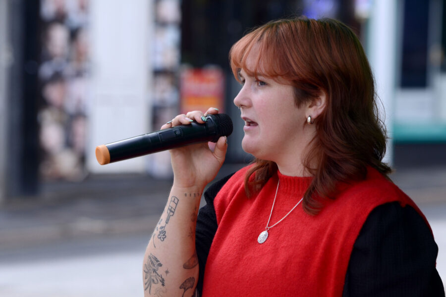 Charlotte White performing at New Street Corner on Honiton Market Charter Day 2025