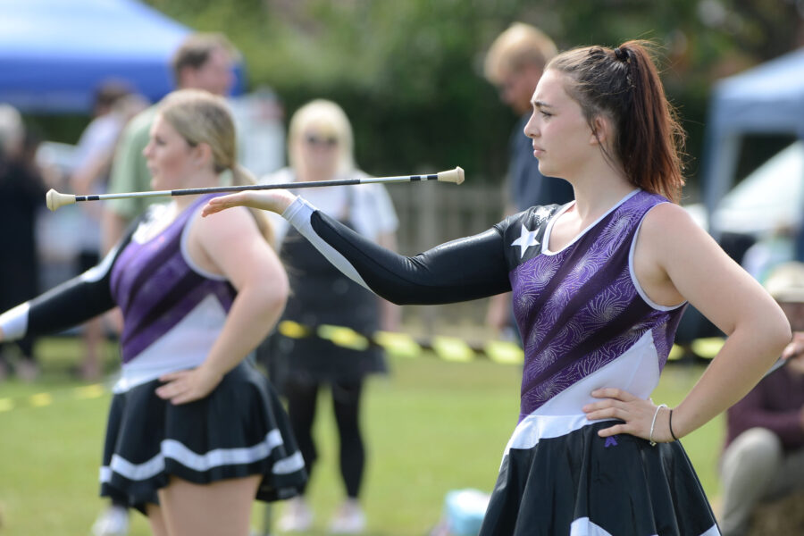 Twirlstars Majorettes performing on Allhallows Field at Honiton Market Charter Day 2025